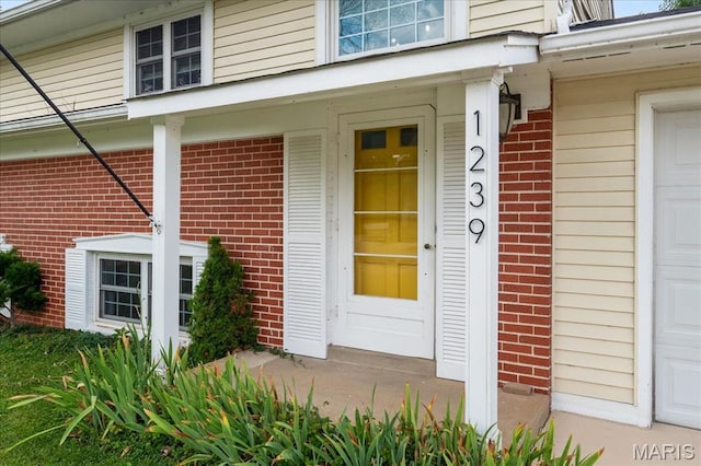 1239 Vero Ln, Ellisville, MO 63011 - property entrance featuring brick siding