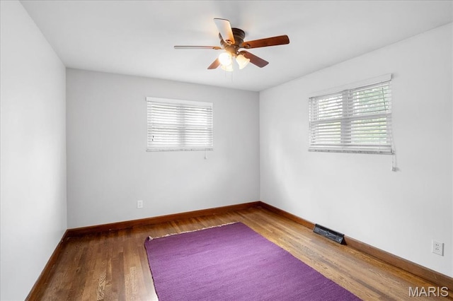 1239 Vero Ln, Ellisville, MO 63011 - unfurnished room featuring ceiling fan and wood finished floors