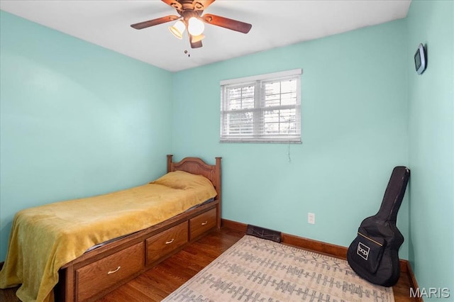 1239 Vero Ln, Ellisville, MO 63011 - bedroom featuring dark wood-style floors and a ceiling fan