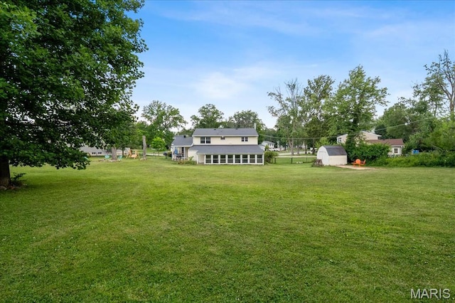 1239 Vero Ln, Ellisville, MO 63011 - view of green lawn with a storage unit