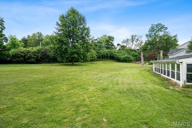1239 Vero Ln, Ellisville, MO 63011 - view of grassy yard with a sunroom