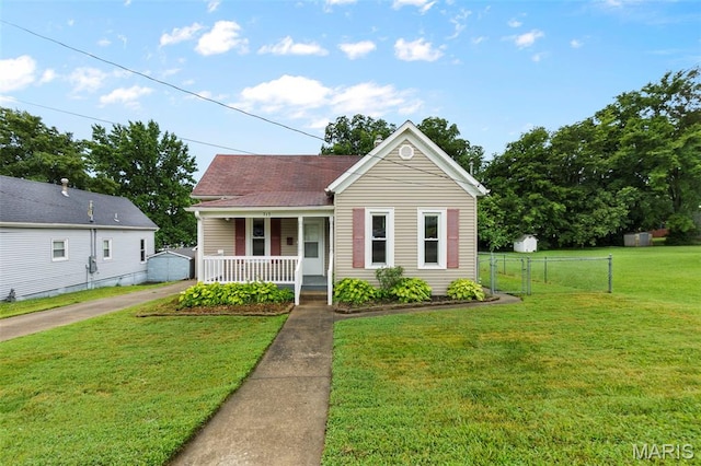 713 W Adams St, Jackson, MO 63755 - view of front of house with covered porch and roof with shingles