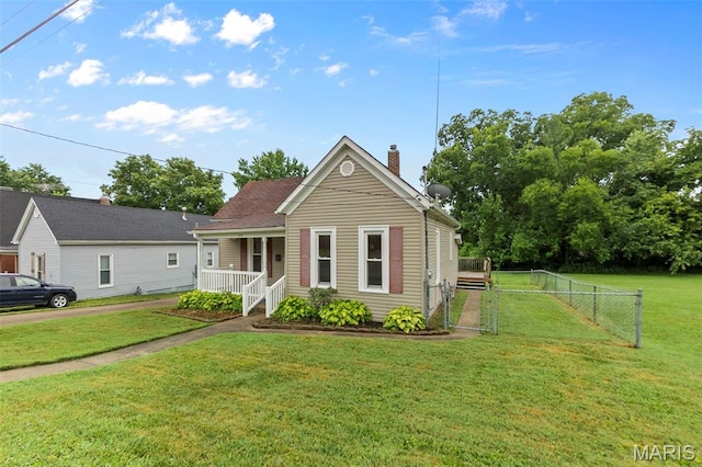 713 W Adams St, Jackson, MO 63755 - view of front facade featuring a chimney, a porch, and a gate