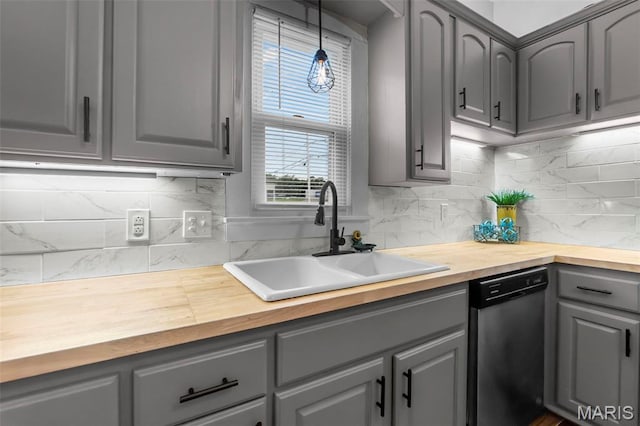 713 W Adams St, Jackson, MO 63755 - kitchen featuring wood counters, gray cabinets, stainless steel dishwasher, and tasteful backsplash