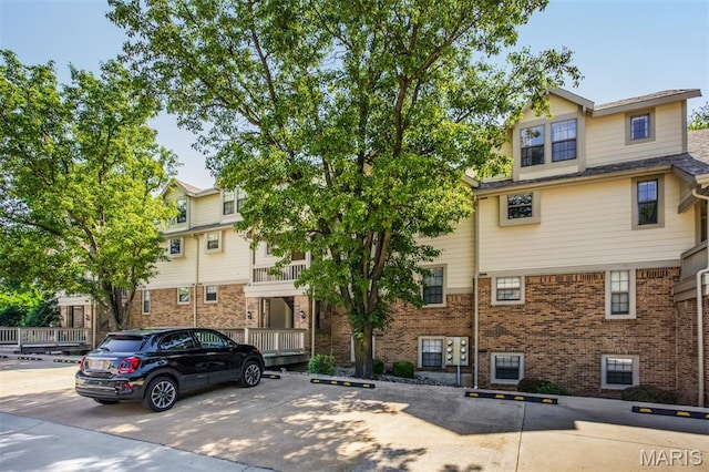 12975 Bryce Canyon Dr Unit D, Maryland Heights, MO 63043 - view of property with uncovered parking