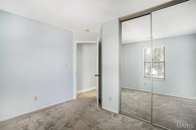 12975 Bryce Canyon Dr Unit D, Maryland Heights, MO 63043 - unfurnished bedroom featuring a closet and carpet