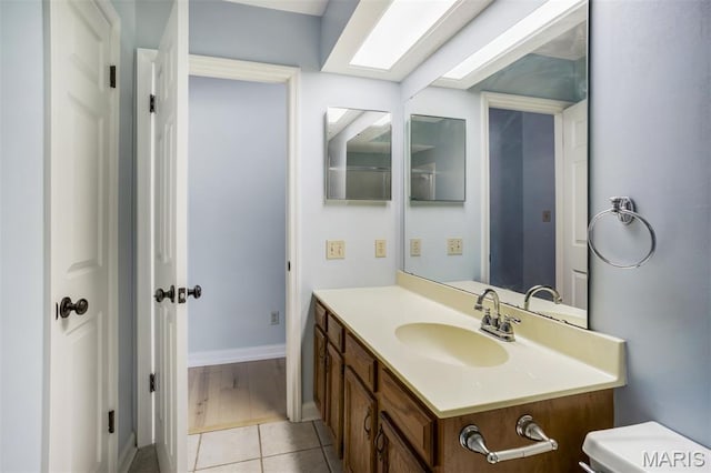12975 Bryce Canyon Dr Unit D, Maryland Heights, MO 63043 - half bathroom featuring vanity and tile patterned flooring