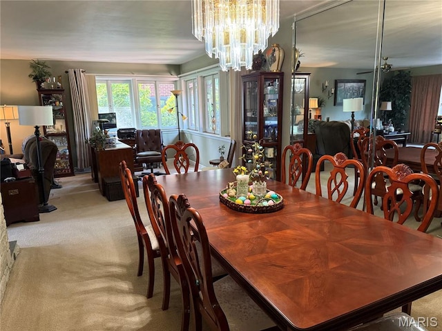 15 Lake Pembroke Dr, Ferguson, MO 63135 - dining space with light colored carpet and a chandelier