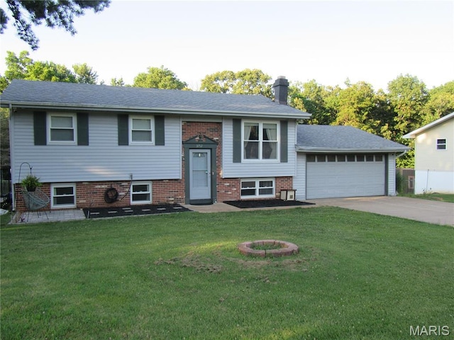 3712 Gail Dr, Imperial, MO 63052 - raised ranch featuring an attached garage, driveway, a chimney, a front lawn, and brick siding