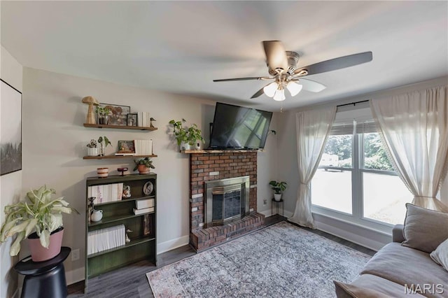 3712 Gail Dr, Imperial, MO 63052 - living room with ceiling fan, a fireplace, and wood finished floors