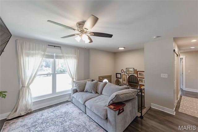 3712 Gail Dr, Imperial, MO 63052 - living area featuring dark wood-type flooring and ceiling fan