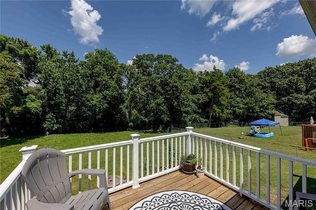 3712 Gail Dr, Imperial, MO 63052 - deck with a fenced backyard and a playground