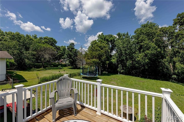 3712 Gail Dr, Imperial, MO 63052 - deck featuring a trampoline and view of wooded area