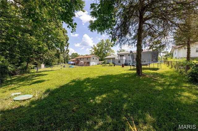 3712 Gail Dr, Imperial, MO 63052 - fenced backyard featuring a trampoline