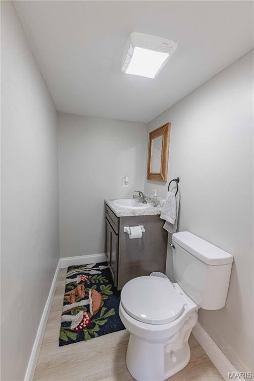 3712 Gail Dr, Imperial, MO 63052 - half bath with vanity and wood finished floors