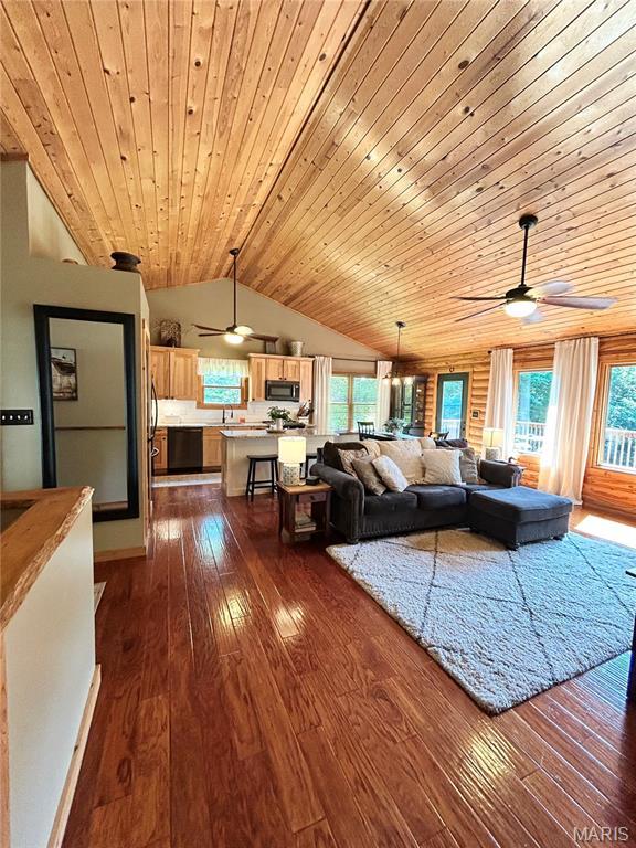 5156 Mccallister Rd, Gerald, MO 63037 - living area featuring a ceiling fan, lofted ceiling, wooden ceiling, and dark wood finished floors