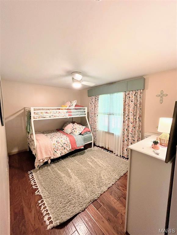 5156 Mccallister Rd, Gerald, MO 63037 - bedroom featuring wood finished floors and a ceiling fan