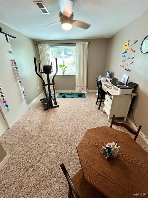 5156 Mccallister Rd, Gerald, MO 63037 - exercise area featuring light carpet and ceiling fan