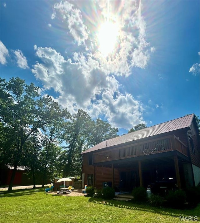 5156 Mccallister Rd, Gerald, MO 63037 - back of property featuring a yard, a metal roof, and a deck