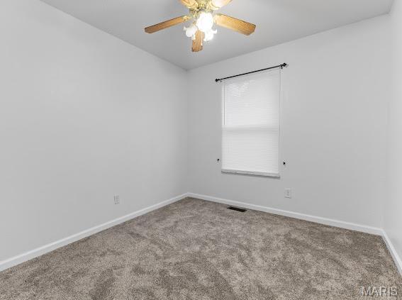 4213 Flucom Rd, De Soto, MO 63020 - spare room with carpet flooring and ceiling fan