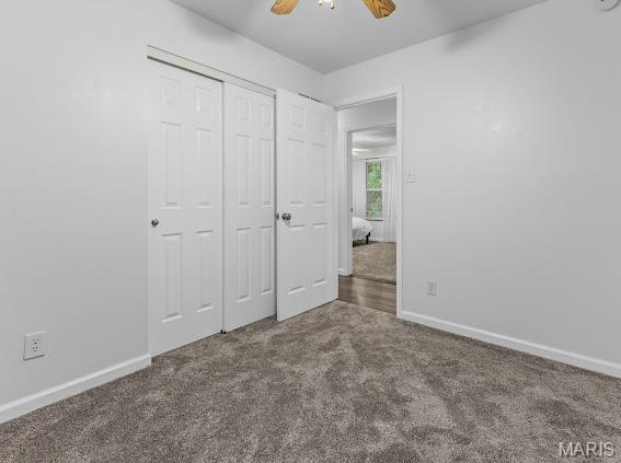 4213 Flucom Rd, De Soto, MO 63020 - unfurnished bedroom featuring carpet flooring, a closet, and a ceiling fan
