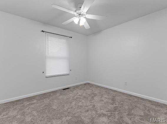 4213 Flucom Rd, De Soto, MO 63020 - empty room with a ceiling fan and carpet