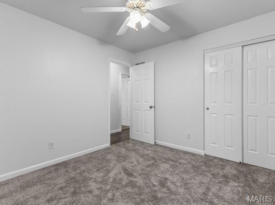 4213 Flucom Rd, De Soto, MO 63020 - unfurnished bedroom featuring carpet, a closet, and a ceiling fan