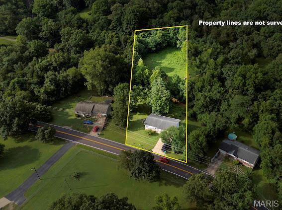 4213 Flucom Rd, De Soto, MO 63020 - view of property location featuring property boundaries highlighted and a heavily wooded area