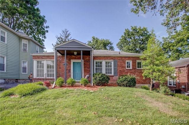 1106 Danforth St, Alton, IL 62002 - ranch-style home featuring a front yard and brick siding