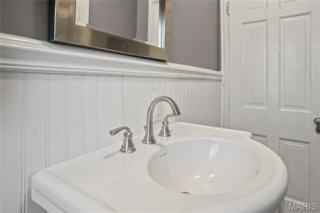 1106 Danforth St, Alton, IL 62002 - bathroom view of wainscoting and a sink