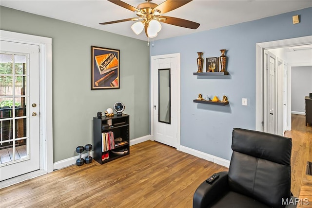 1106 Danforth St, Alton, IL 62002 - living area featuring wood finished floors and ceiling fan