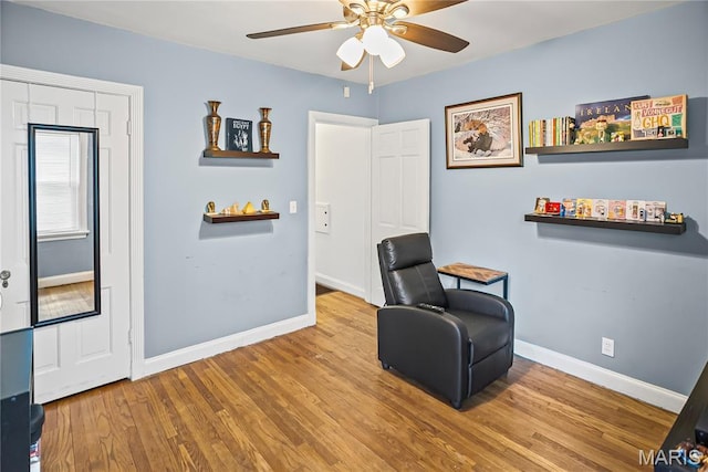 1106 Danforth St, Alton, IL 62002 - sitting room featuring ceiling fan and wood finished floors