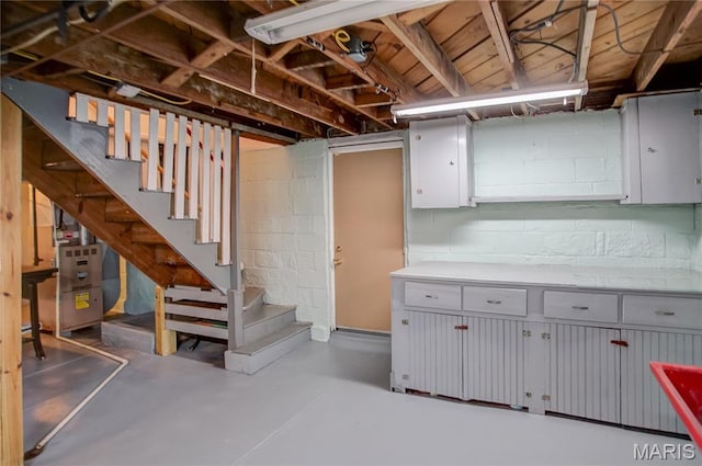 1106 Danforth St, Alton, IL 62002 - below grade area featuring stairs and concrete block wall