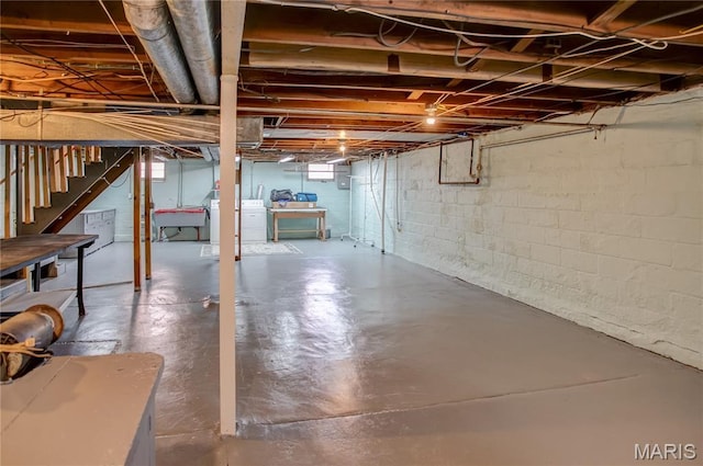 1106 Danforth St, Alton, IL 62002 - below grade area featuring washer / dryer and stairs