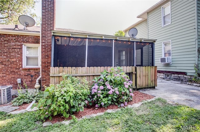 1106 Danforth St, Alton, IL 62002 - view of patio with a sunroom and cooling unit