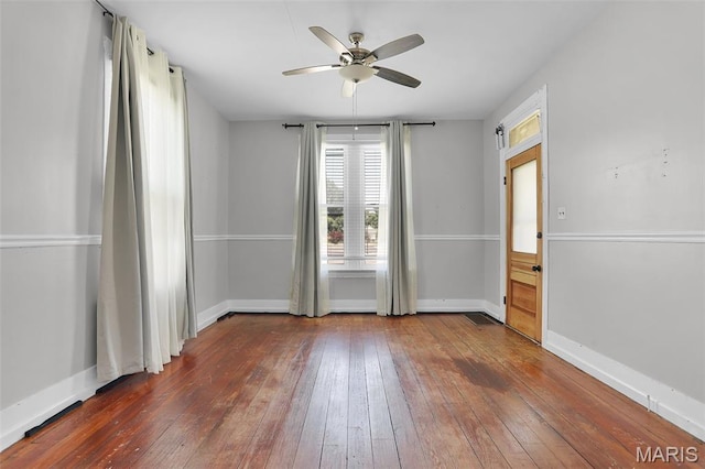 111 N Duncan St, Marine, IL 62061 - empty room with a ceiling fan and hardwood / wood-style flooring