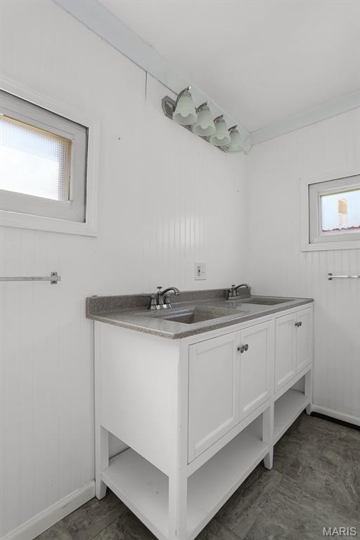 111 N Duncan St, Marine, IL 62061 - bathroom featuring double vanity and baseboards