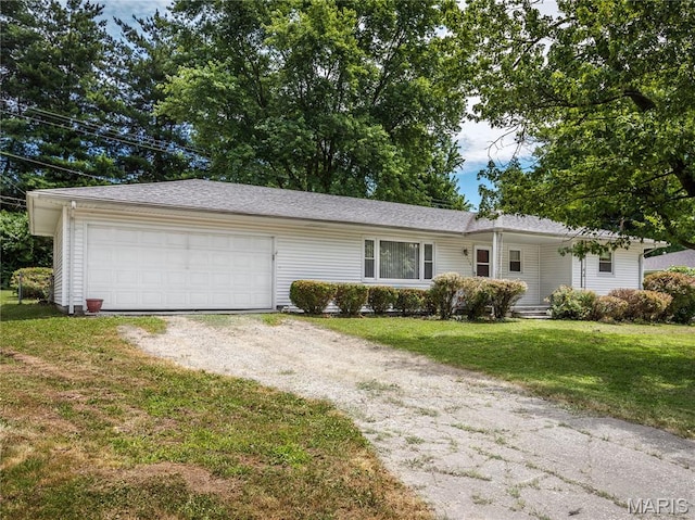 118 Alice Dr, Ofallon, IL 62269 - ranch-style home with driveway, a garage, and a front yard