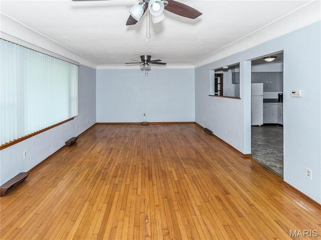 118 Alice Dr, Ofallon, IL 62269 - spare room with a ceiling fan, light wood-type flooring, and ornamental molding