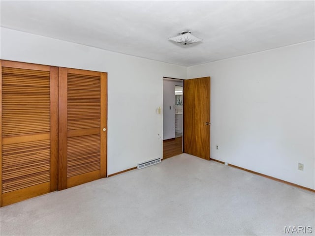 118 Alice Dr, Ofallon, IL 62269 - unfurnished bedroom featuring carpet floors and a closet