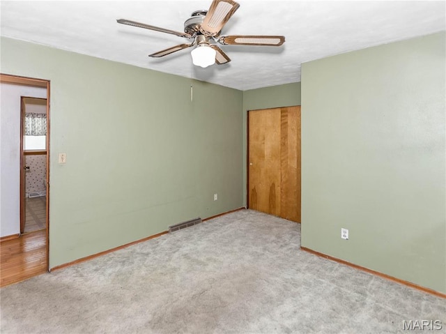 118 Alice Dr, Ofallon, IL 62269 - carpeted spare room featuring ceiling fan and baseboards