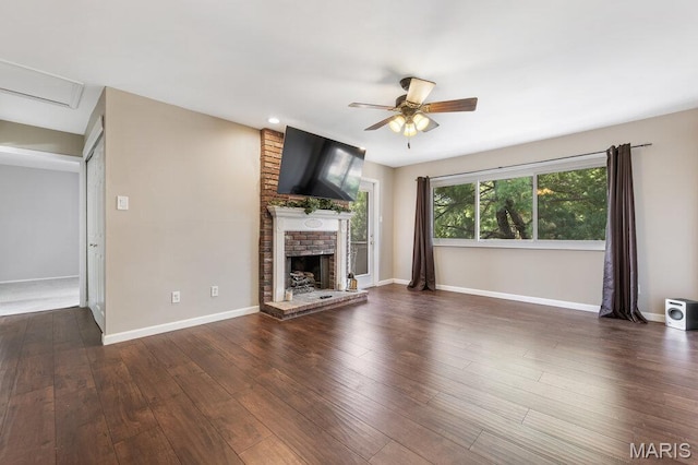 4 Fairways Cir Unit I, Saint Charles, MO 63303 - unfurnished living room with a ceiling fan, a brick fireplace, and wood finished floors