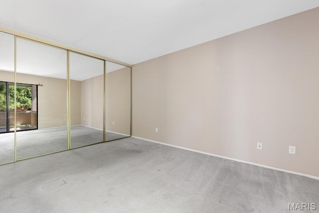 4 Fairways Cir Unit I, Saint Charles, MO 63303 - unfurnished bedroom with carpet flooring and baseboards