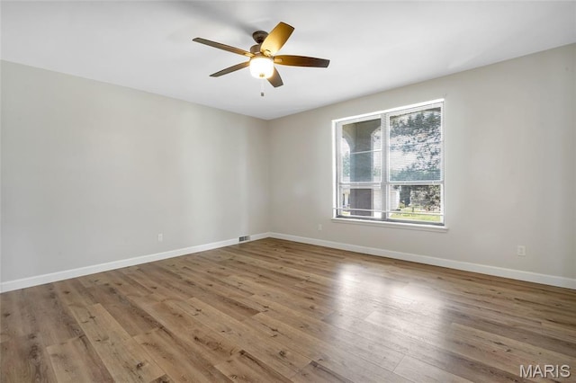 904 Ampere Pl, Lake St Louis, MO 63367 - spare room with ceiling fan and wood finished floors
