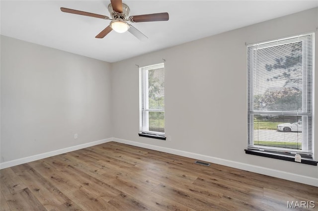 904 Ampere Pl, Lake St Louis, MO 63367 - spare room with wood finished floors and ceiling fan