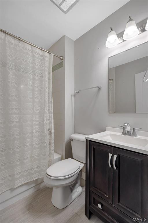 904 Ampere Pl, Lake St Louis, MO 63367 - full bathroom with vanity, shower / bath combo, and wood finished floors
