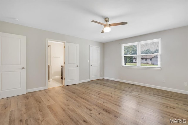 904 Ampere Pl, Lake St Louis, MO 63367 - unfurnished bedroom featuring light wood-type flooring, ensuite bathroom, and ceiling fan