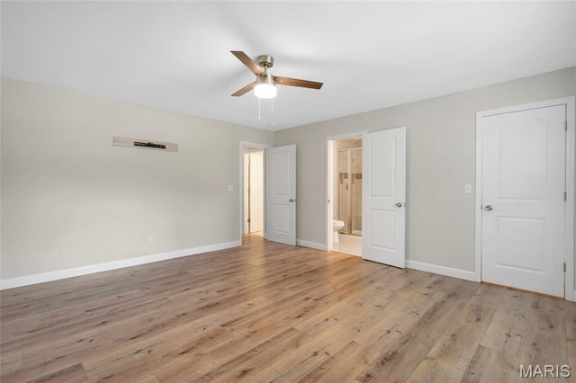 904 Ampere Pl, Lake St Louis, MO 63367 - unfurnished bedroom featuring light wood finished floors, ensuite bath, and a ceiling fan