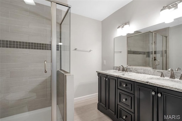 904 Ampere Pl, Lake St Louis, MO 63367 - full bathroom with double vanity and a shower stall