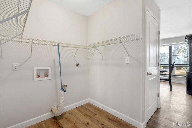 904 Ampere Pl, Lake St Louis, MO 63367 - laundry area with hookup for an electric dryer, wood finished floors, and hookup for a washing machine